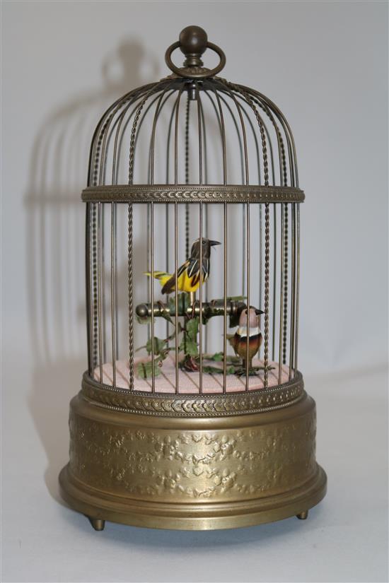 A mid 20th century musical brass birdcage automaton by Reuge Music, Saint-Croix, Switzerland, 11.25in.